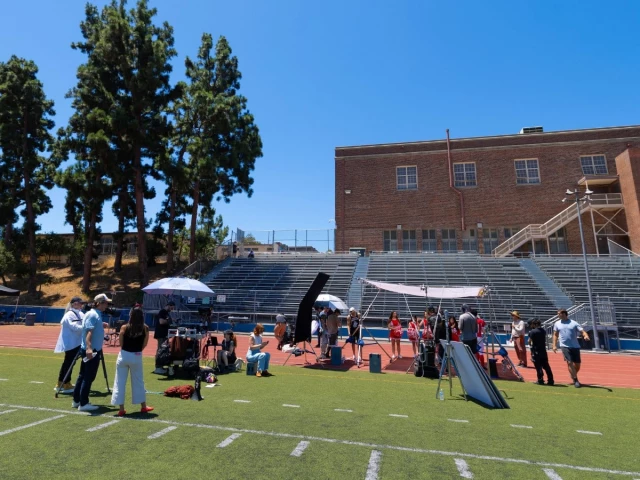 a small crew of actors and production people work in a candyjar microdrama production involving high school football and cheerleaders at a high school in los angeles california us on july 7 2026 photo reuters