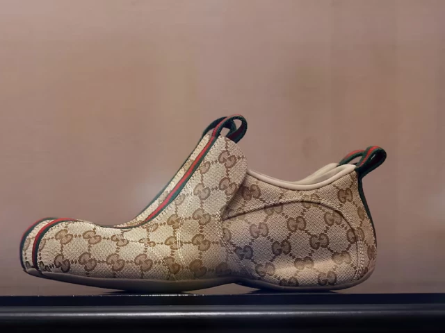 drip sneaker model by gucci is displayed in a gucci store in paris france photo reuters